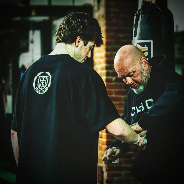 Coach wrapping hands at CVBC